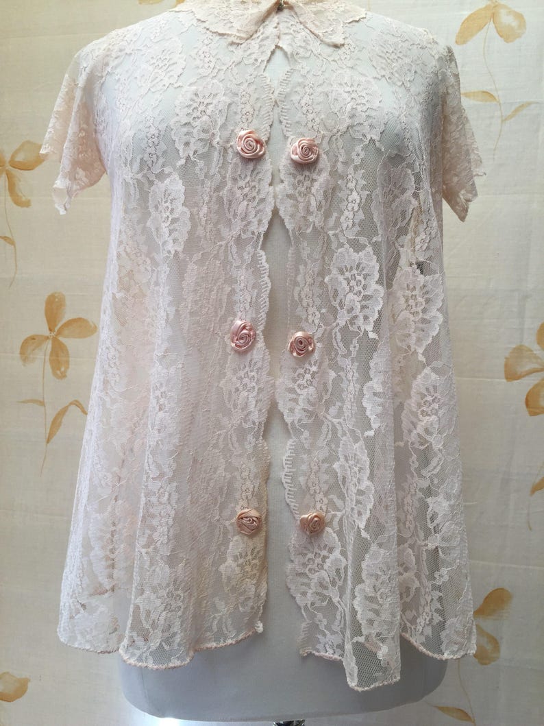 Sweet 1960s sheet net lace swing blouse with ribbon roses and scalloped edging