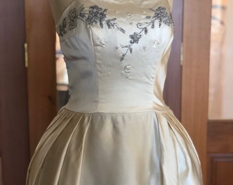 Duchess satin 1950s bride dress with beaded bodice