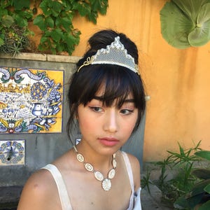 Handmade antique embroidered beaded lace tiaras. Wedding or races millinery