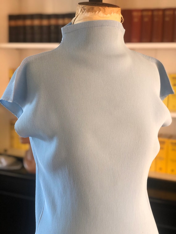 Iconic Pleats Please designer shell blouse