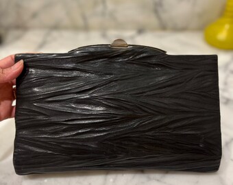 Art deco 1920s leather and chrome clutch bag
