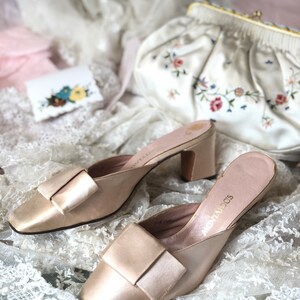 1960s Montaldo’s silk satin mules with large bow.