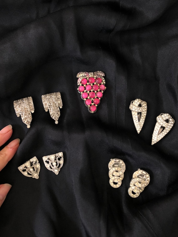 Rhinestone studded Vintage dress clips.