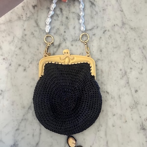 Antique handmade purse with elephant closure and removeable pearl handle