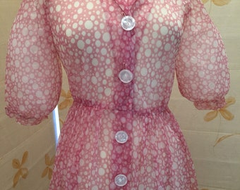 Pretty 1960s sheer nylon fit and flare dress with puff skeeves