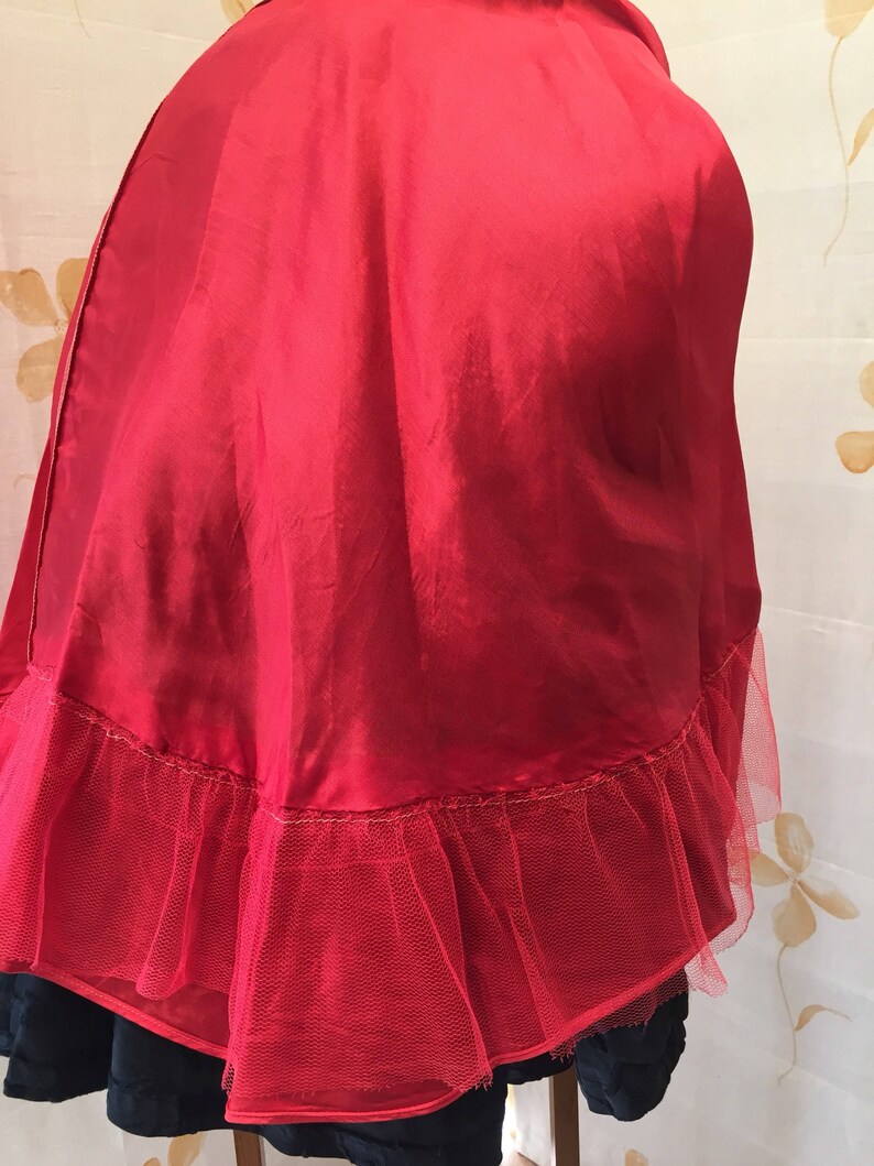 1950s black fit and flare embroidered taffeta cocktail dress with red piping