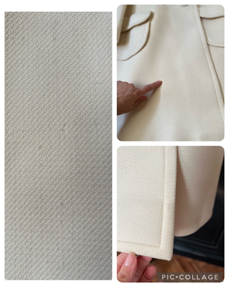 May include: A close-up of a white coat with a herringbone pattern. The coat has a pocket on the front and a seam down the side. The fabric is soft and smooth.