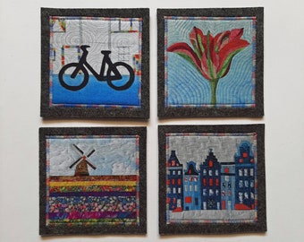 set of 4 coasters  bike, tulip, houses and windmill, dark grey