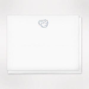 May include: White stationery set with a light blue illustration of two dumplings. The stationery is stacked, with the top sheet featuring the dumpling design in the upper center. The paper has a clean, minimalist aesthetic.