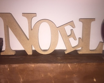 NOEL, freestanding word NOEL, letters spelling NOEL, Christmas Decoration