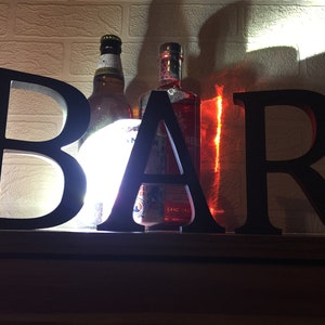 BAR Letras de madera negras independientes Barra de ortografía