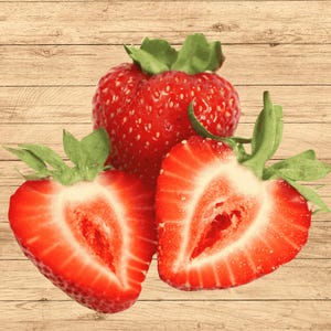 May include: Three bright red strawberries, one whole and two halved, displaying a vibrant red interior flesh with small yellow seeds on the outer skin and green leafy stems attached to the top of each piece of fruit.