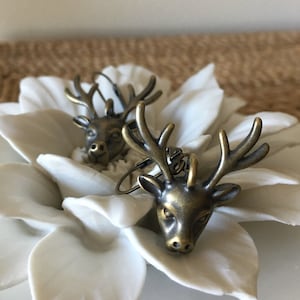 Oh deer. Brass Deer with Antlers dangle earrings.