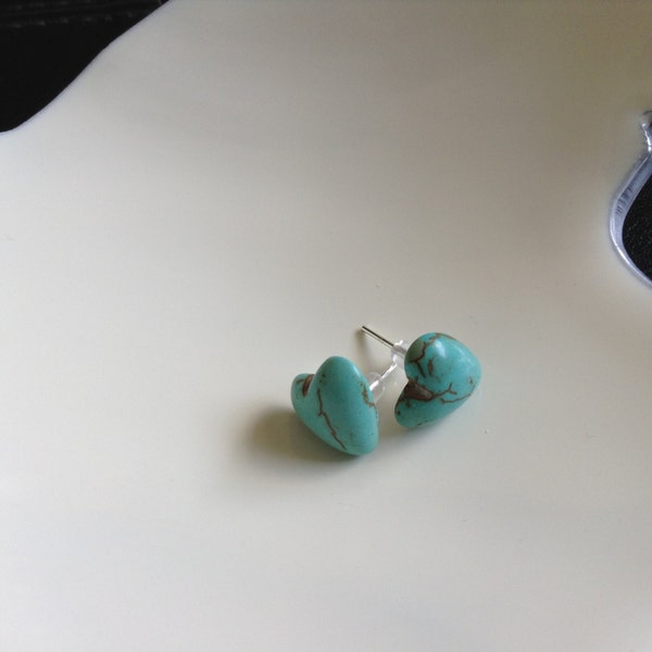 Heart shaped turquoise stone post earrings. Almost as unique as you.