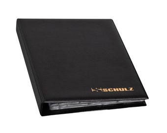 May include: Black leather binder with the text "H. Schulz" embossed in gold on the front cover.