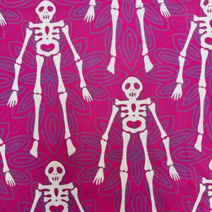 May include: A repeating pattern of white skeletons on a vibrant pink background. The skeletons are detailed with visible rib cages, skulls, and limbs. The background features a subtle, repeating floral design in shades of purple and pink.