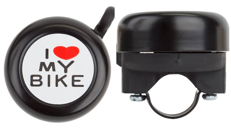 May include: Black bicycle bell with the text "I ❤️ MY BIKE" in white and red. The bell has a rounded top and a mounting bracket for attachment to the handlebars. A small lever is attached to the top for ringing.