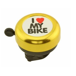 May include: A gold-colored bicycle bell with a black lever. The bell has a white center with the words "I MY BIKE" and a red heart symbol. The bell is designed to attach to a bicycle handlebar.