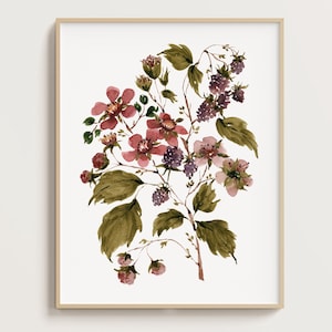 May include: A framed watercolor print featuring a botanical illustration of blackberry branches with pink flowers, dark purple berries, and green leaves. The artwork is displayed in a light-colored wooden frame against a plain white background.