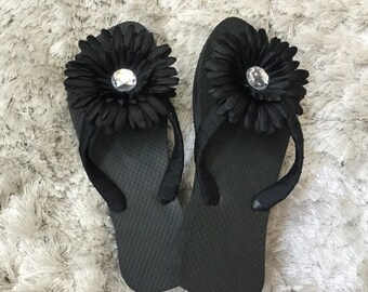 flip flops with big flowers on top