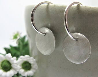 Sterling silver hoop earrings with silver discs