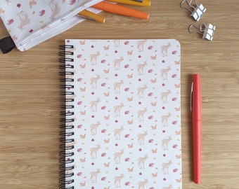 Medium-sized wire-o spiral notebook with autumn pattern and squirrel hedgehog fawn animals and autumn leaves
