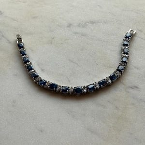 Sterling Silver Oval cut Sapphires, w/Cubic accent stones, Tennis bracelet
