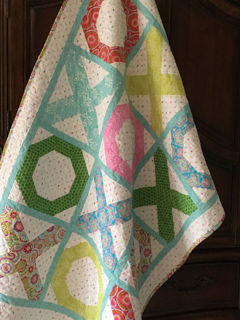 Handmade multicolored lap quilt hugs and kisses toddler quilt; Girl