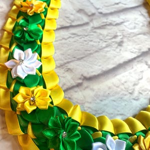 beautiful flower ribbon lei 4 strand lei with green and yellow flowers