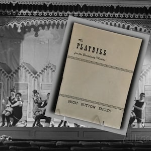 May include: Black and white photo of a stage with a group of performers in black and white costumes. A playbill for the Broadway Theatre is in the foreground, advertising the show "High Button Shoes".