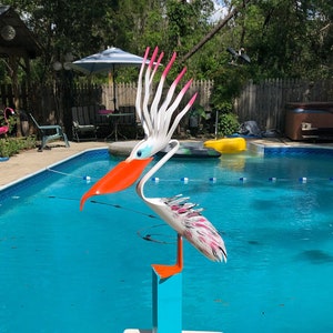 Freda Fred's Wife and Companion Pelican With Feet Spikes