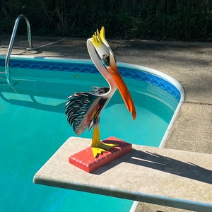 Sunset Susan The Pole Sitting Pelican With Base
