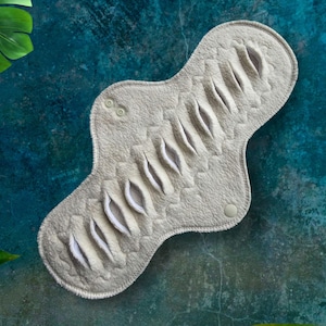 organic cotton sherpa pad made with undyed cotton with gusher pad slits