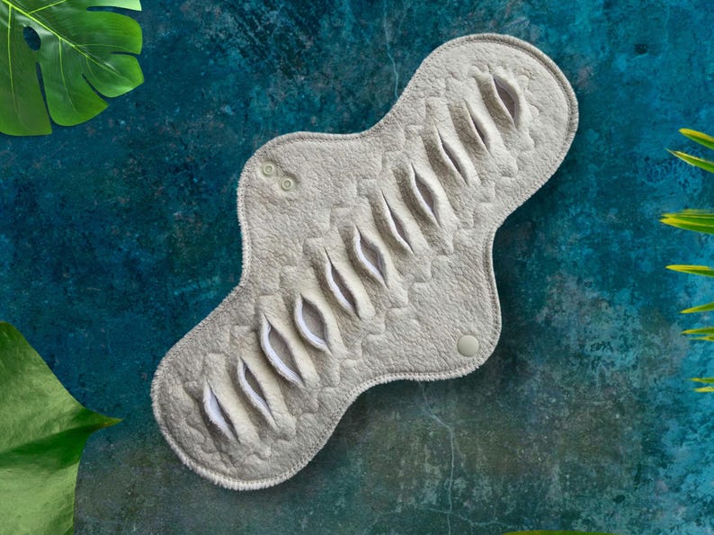 organic cotton sherpa pad made with undyed cotton with gusher pad slits