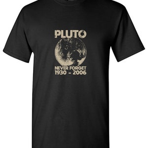 May include: Black t-shirt with a graphic of Pluto, the text "Pluto", and the text "Never Forget 1930 - 2006".