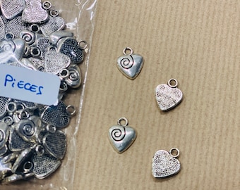 100 heart charms with small spiral, small metal alloy pendant - 100 pieces per bag