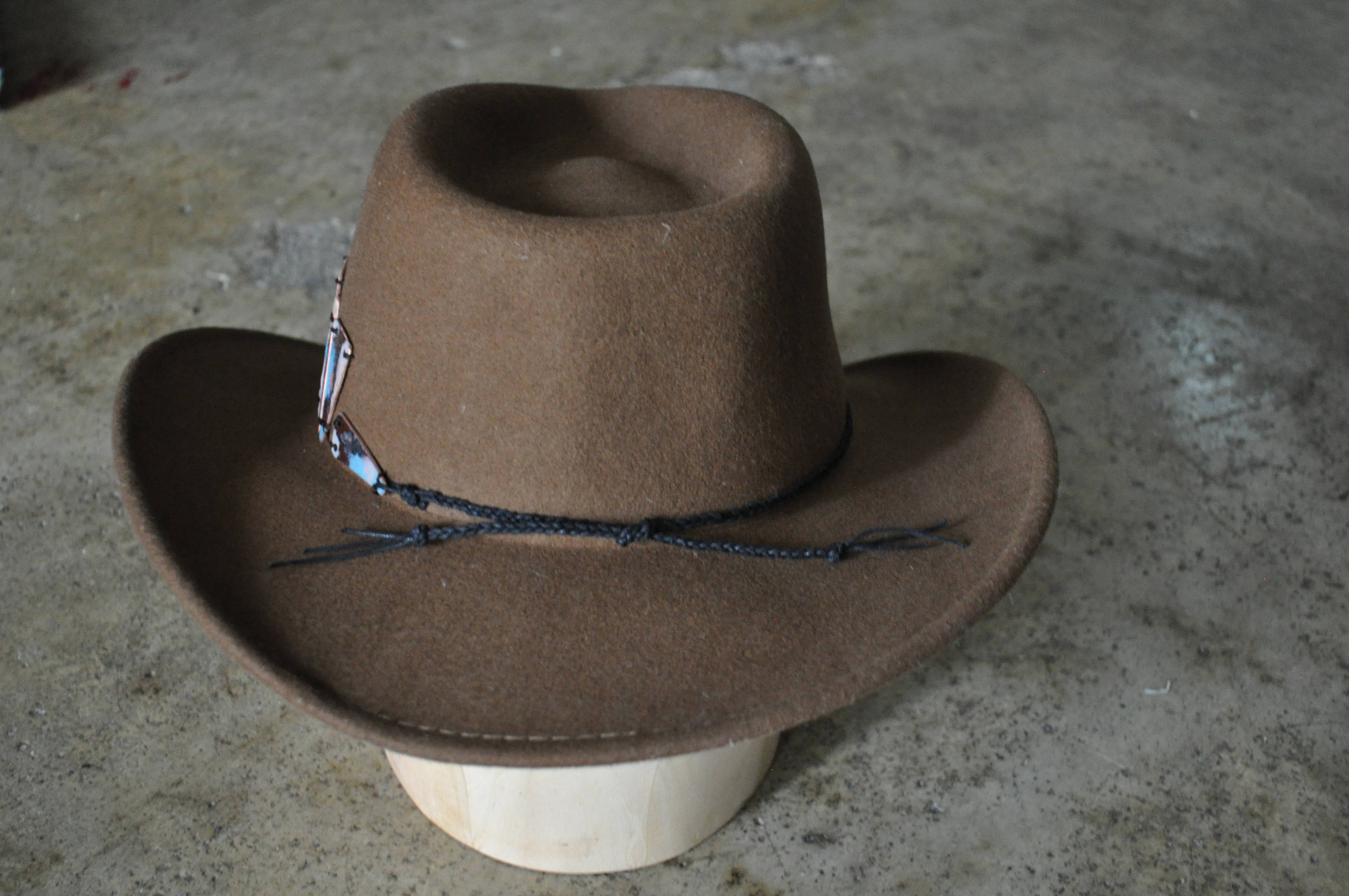 Brown Felt Western Hat with Turquoise Feather and Navajo Print Band A little more… @hoylehat #hatbar #downtownseattle  main image 2