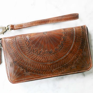 Blau Handgelenktasche. Ledergeldbörse. Brieftasche