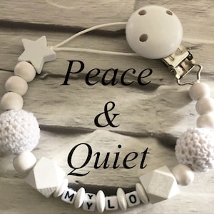 Beautiful handmade Personalised dummy clip, wooden dummy chain, wooden pacifier clip for a boy or girl in white with plastic letters.