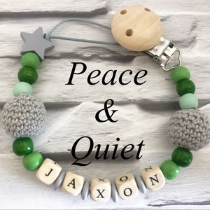 Beautiful handmade Personalised dummy clip, wooden dummy chain, wooden pacifier clip for a boy or girl in grey and green colours.