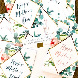 May include: A collection of Mother's Day cards with floral designs. Each card features the text "Happy Mother's Day!" in elegant script, framed by gold borders and adorned with watercolor roses and eucalyptus leaves. Some cards include the quote: "A mother is like a flower, each is beautiful and unique."