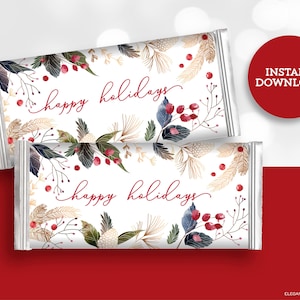 Puede incluir: Dos envoltorios de barra de chocolate imprimibles con fondo blanco y un diseño de acuarela de hojas doradas y verdes, bayas rojas y el texto "felices fiestas".