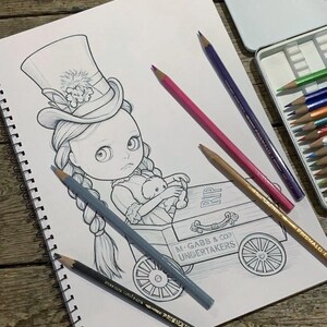 May include: A graphite drawing in a spiral-bound sketchbook depicting a doll with braided hair wearing a top hat, sitting in a wheeled cart labeled M. GABB & COP UNDERTAKERS with RIP on the side. Several colored pencils are placed on the page.
