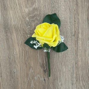 Yellow Rose Buttonhole: Wedding groom Boutonniere with gypsophila
