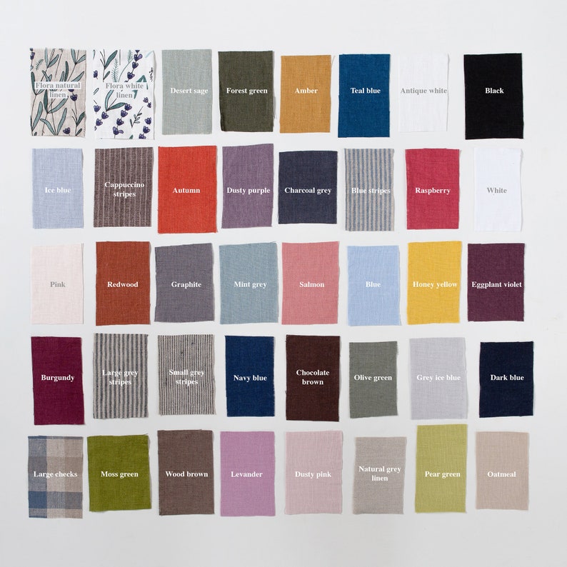 May include: A collection of linen fabric swatches in various colors, including shades of green, blue, red, and neutral tones. Each swatch is labeled with its color name, such as "Autumn," "Teal Blue," and "Honey Yellow." The image also includes two swatches with text: "Flora natural linen" and "Flora white linen."