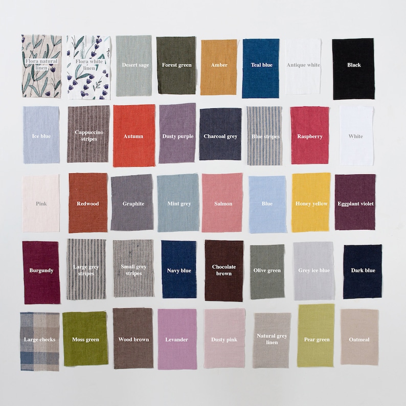 May include: A chart of 40 fabric swatches with names for each color. The swatches are arranged in a grid of 8 columns and 5 rows. The colors include: Flora natural linen, Flora white linen, Desert sage, Forest green, Amber, Teal blue, Antique white, Black, Ice blue, Cappuccino stripes, Autumn, Dusty purple, Charcoal grey, Blue stripes, Raspberry, White, Pink, Redwood, Graphite, Mint grey, Salmon, Blue, Honey yellow, Eggplant violet, Burgundy, Large grey stripes, Small grey stripes, Navy blue, Chocolate brown, Olive green, Grey ice blue, Dark blue, Large checks, Moss green, Wood brown, Levander, Dusty pink, Natural grey linen, Pear green, Oatmeal.