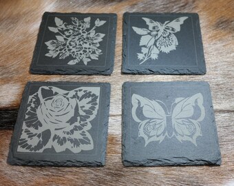 Juegos de posavasos de pizarra con mariposas y flores