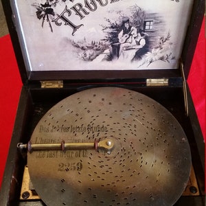 Antique Disc Music Box. Restored with 12 discs
