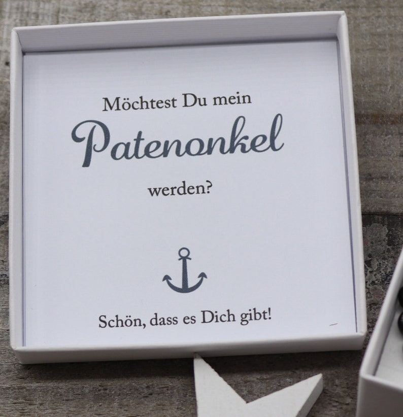A lovingly designed key fob with the lettering /'Patenonkel/'