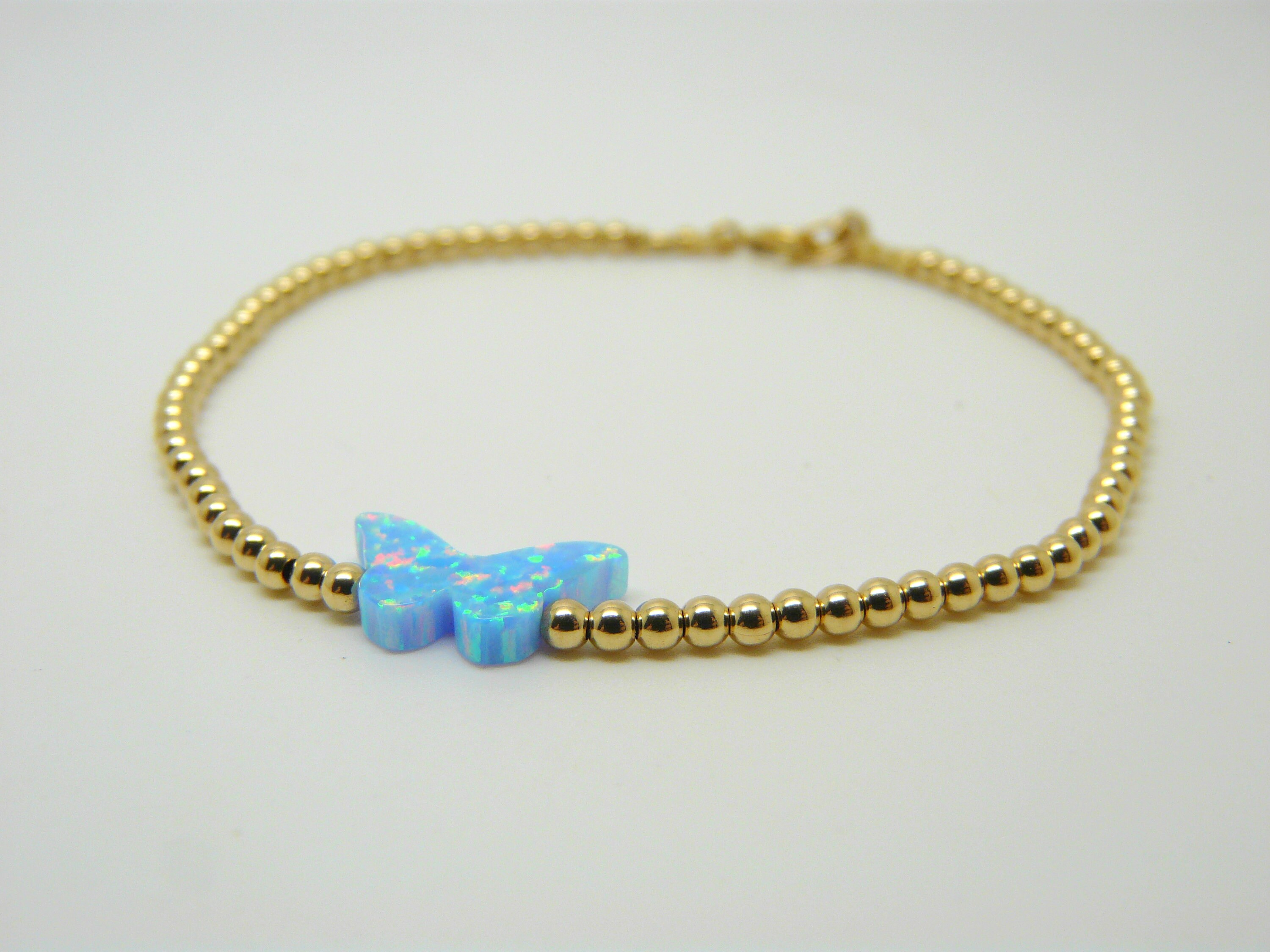 BUTTERFLY DARK MOP GOLD BRACELET